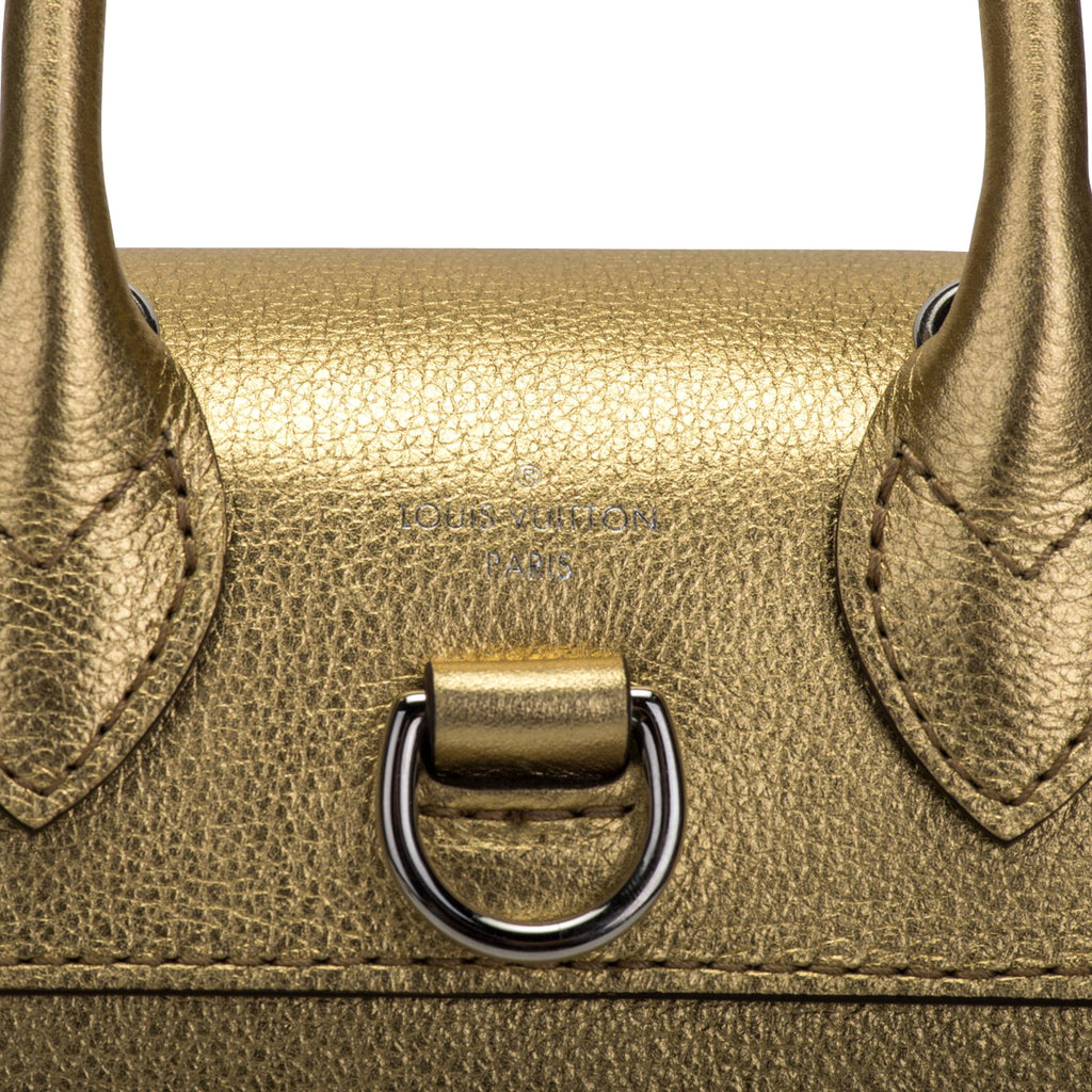 Louis Vuitton Gold Lockme Backpack