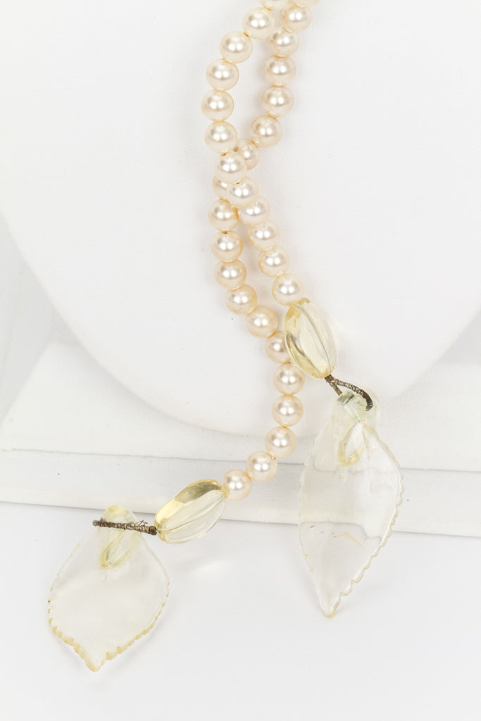 Chanel long pearl necklace with camellia