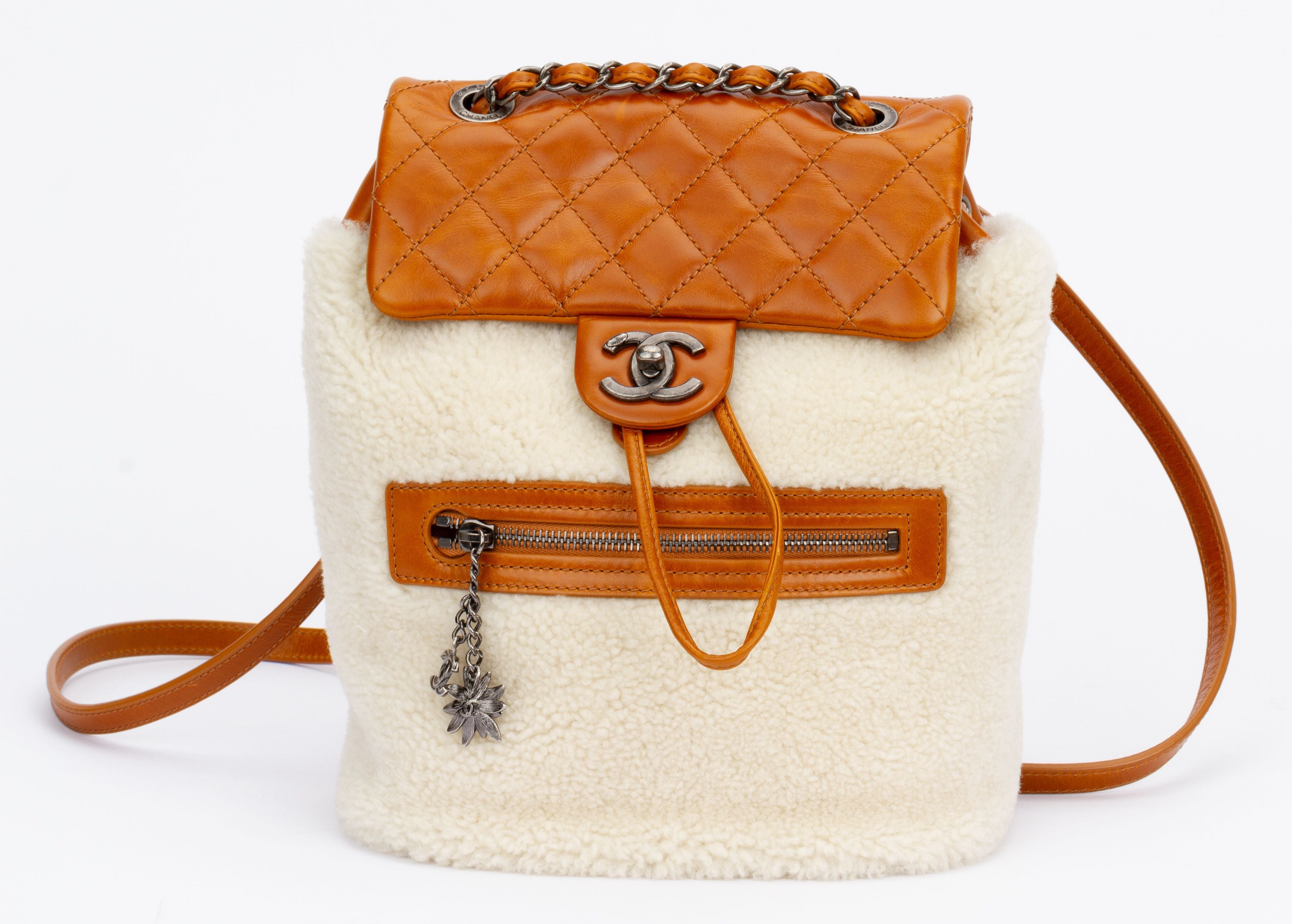 Combined shearling-effect leather bag - Women